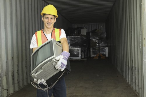 Team of professionals conducting garage clearance